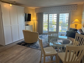 cozy common space with a homey feel and a queen murphy bed