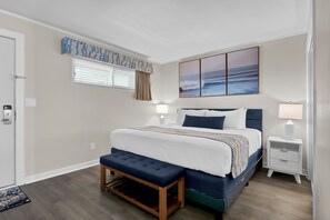 Tranquil, spacious bedroom with a luxurious king-size bed