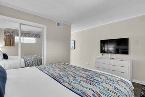 Tranquil, spacious bedroom with a luxurious king-size bed