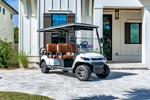 FREE 6-seat golf cart for your stay