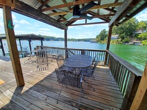 table & chairs for 6 under covered dock. additional 4 chairs & table uncovered 