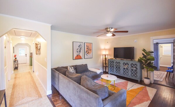 The cozy living room anchors the home.