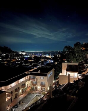 See the city lights and Casino at night