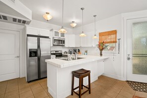 Kitchen with plenty of pans and cookie sheets