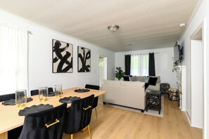 Dining room table for guests to enjoy a meal with their family.