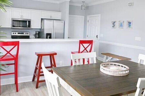 Kitchen, bar, dining combination