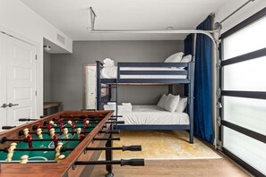 Game room bedroom with full over full bunk beds