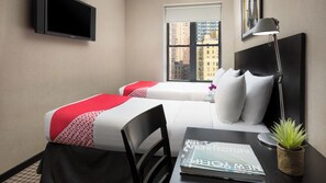 Bedroom with a comfortable 2 Double size beds. The exact unit will be assigned upon arrival. Views, colors, and decorations may vary.