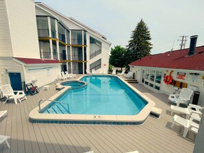 Our heated pool and hot tub for guests to relax in (open seasonally from Memorial Day through Labor Day)