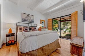 Bedroom 1: Full bed, closet, dresser,  sliding doors out to the backyard, main floor