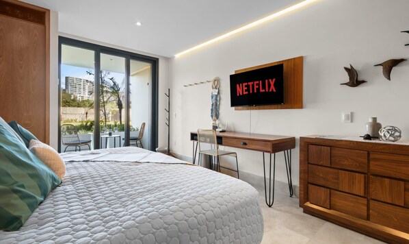 King-size bed with desk and Smart TV