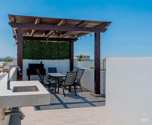 You'll love hanging out on your private roof terrace with a BBQ and table