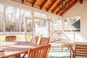 Spend the day relaxing in the screened in porch.
