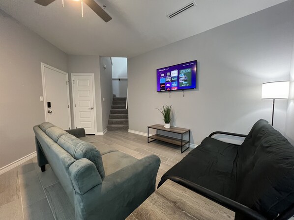 Living Room with Smart TV and Futon