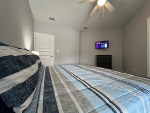 Primary Bedroom with King Bed and Smart TV