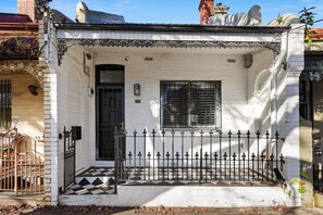 This heritage terrace offers modern comforts and is conveniently located just moments from cafes, parks and public transport. 
