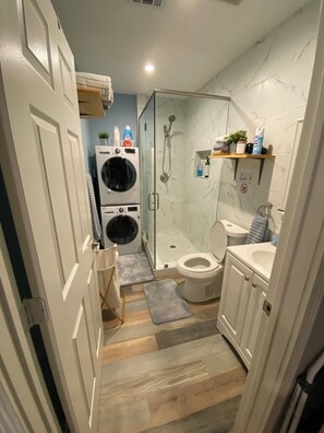 Bathroom with stand in shower