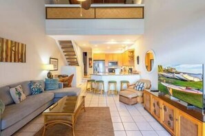 Beautiful Hawaiiana decor throughout this 2 story loft style condo