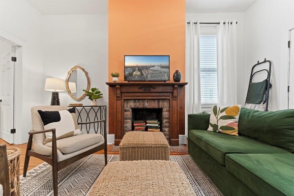 With seating for four, this inviting living room is the perfect spot to relax after a day of exploring Savannah.