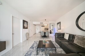 Open floor plan that seamlessly connects the kitchen, living room & dining room!