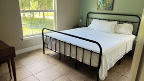First bedroom with comfortable king size bed.
