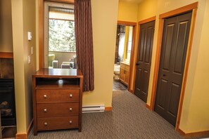 View from the bed, bathroom down the short hall