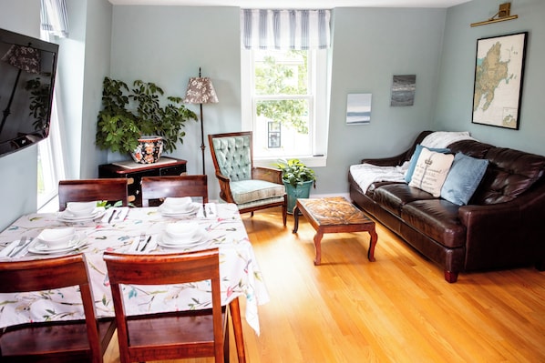 Hardwood floors throughout the apartment create an open feeling space