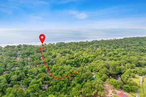 Immerse yourself in the community pool's refreshing waters or venture forth to explore the resort's myriad offerings—from pristine beaches just .4 miles away to world-class amenities like tennis and golf.