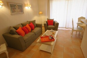 Kick back your feet and relax in the cozy living area.