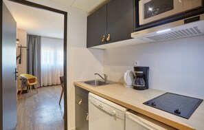 Prepare snacks in the kitchenette.