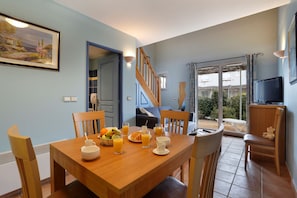 Share meals and laughs at the dining table.