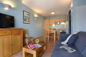 Sink into the cozy sofa after a day exploring the area.