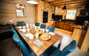 Loads of room at the dining table and the open-concept is always nice for the cook.