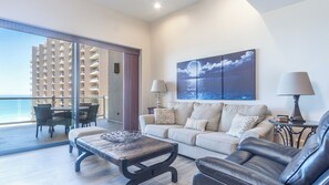 The comfortable living room includes a recliner