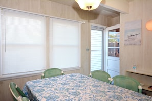 Enter into the dining area with 1/2 bath located just around the corner!