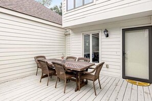 Dine al fresco on the front deck and hear the ocean waves only a block away!