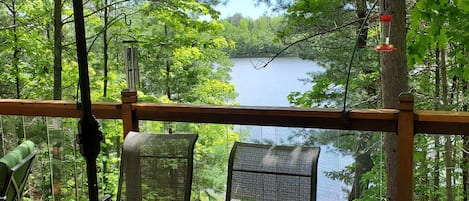 View of lake from dining table on the deck