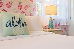 Guest bedroom offers fun beach vibes, Queen bed, smart tv, USB lamps & fan