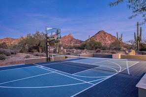 Sport court equipped with basketball and pickleball