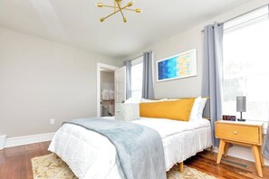 Your private retreat with comfy queen bed, an ensuite bathroom, Roku TV, and a chest of drawers.