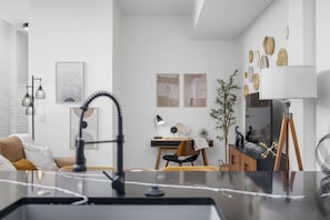 Enjoy seamless flow between the kitchen and living area, making it easy to cook, dine, and relax while staying connected with your guests.