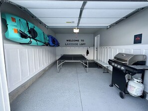 Two kayaks, paddles, life jackets. Ping Pong table. Two Tommy Bahama chairs. Four pickleball paddles and two balls, and a propane grill!