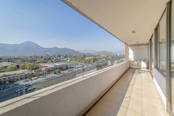 Relax on your private balcony with breathtaking city and mountain views, perfect for enjoying a morning coffee or evening sunset.