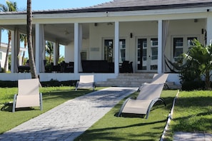 Enjoy island breezes from your private backyard retreat with plenty of seating
