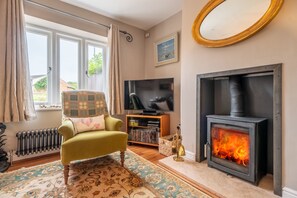 27 Sea Lane, Old Hunstanton: Sitting room with wood burning stove