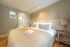 Garden Cottage, Brancaster:  Master bedroom with super-king size bed and en-suite
