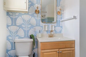 Bathroom with funky wallpaper