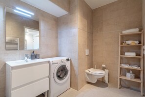 Bathroom with washing machine