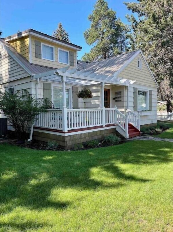 Front view of the cottage. Beautiful front and back decks to enjoy. Tranquil! 