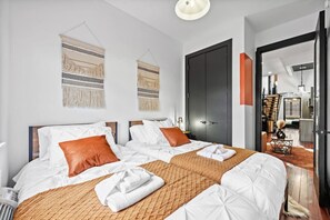 Inside this cozy and stylish bedroom you’ll find two single beds thoughtfully arranged to provide both comfort and warmth.